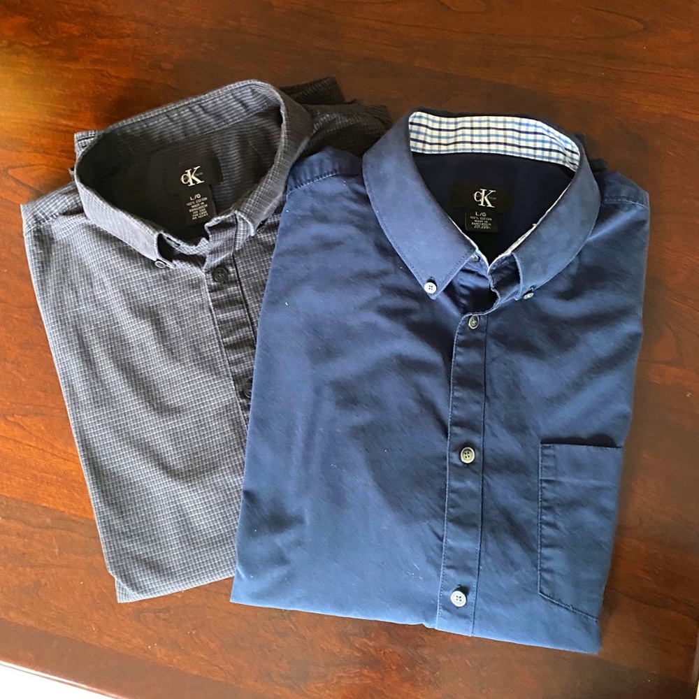 Two Calivn Klein Large button down shirts